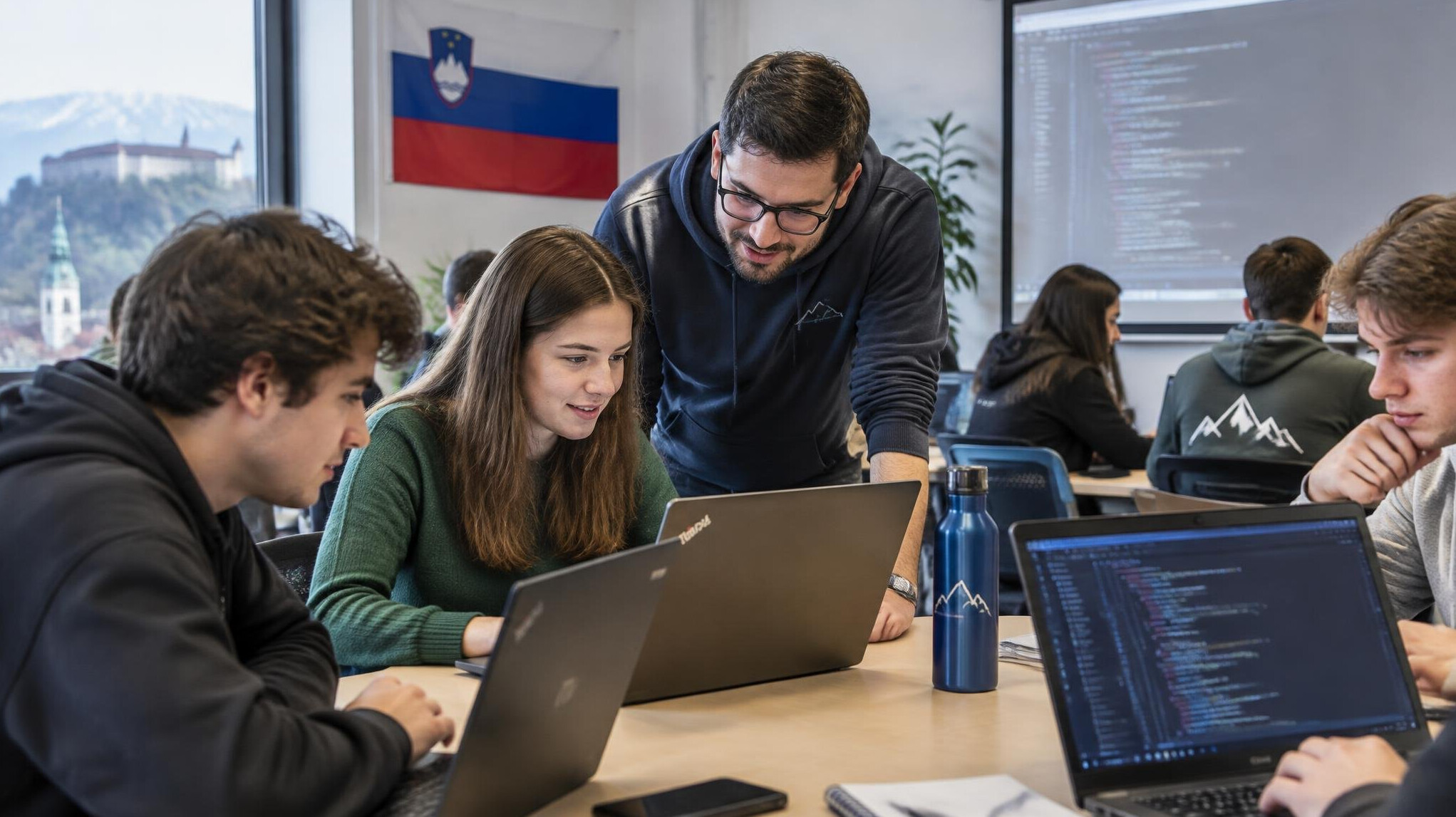 group of slovenians in coding workshop