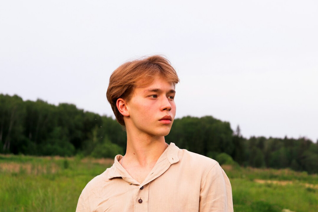 Portrait of a young man in a collared shirt